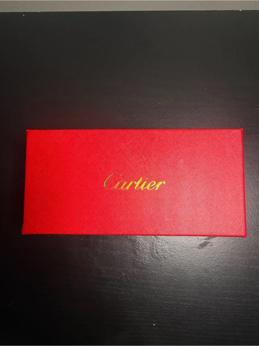 Cartier Women's Rimless Sunglasses with Burgundy Lenses and Gold Accents